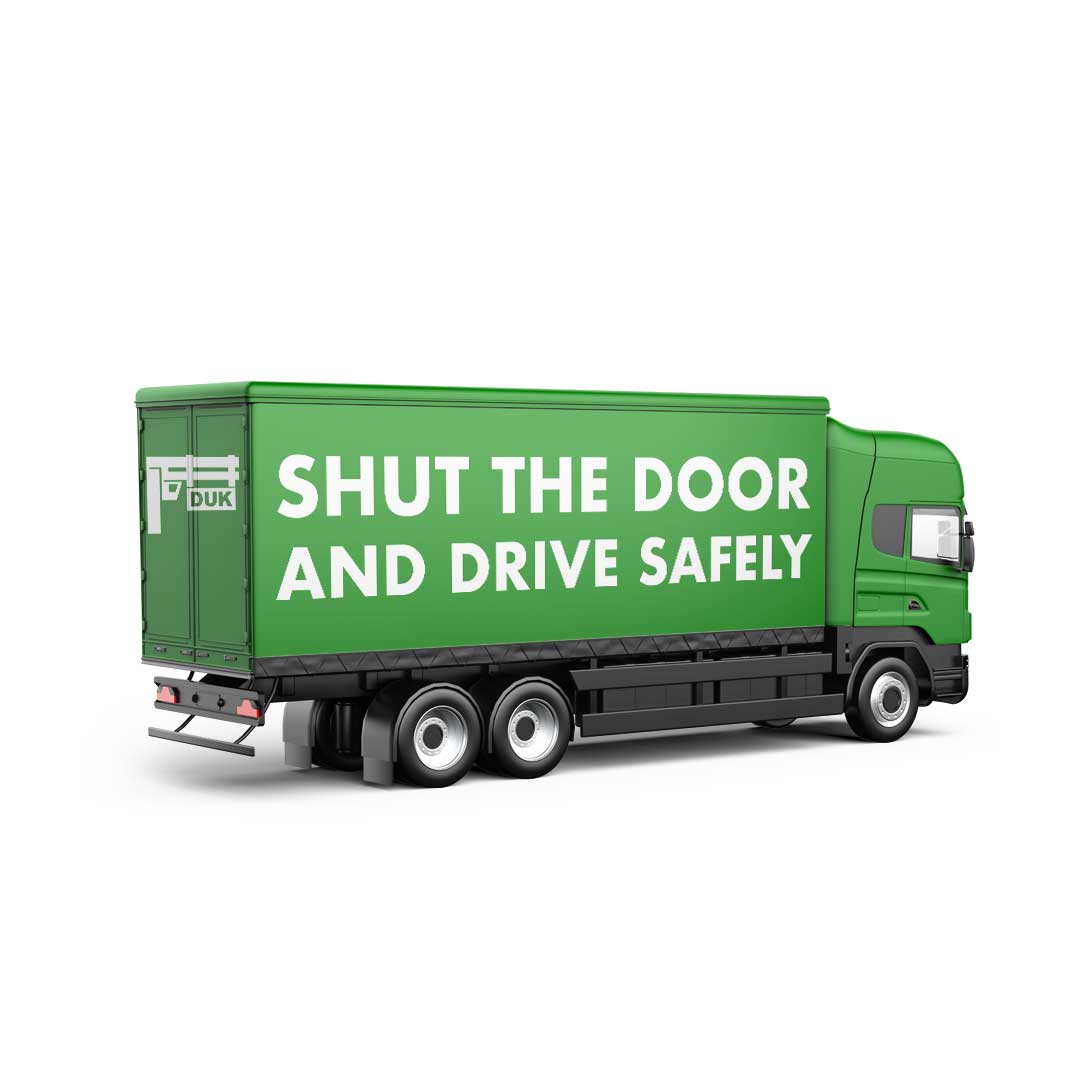 LKW mit shut the door and drive safely schriftzug